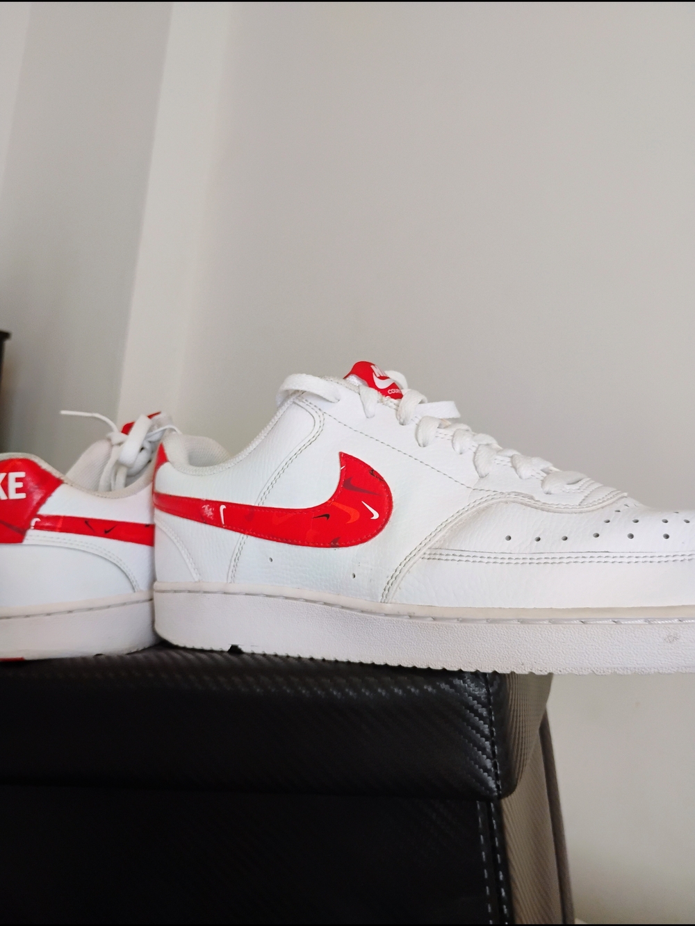 Nike Men’s White Sneakers with Red Swoosh